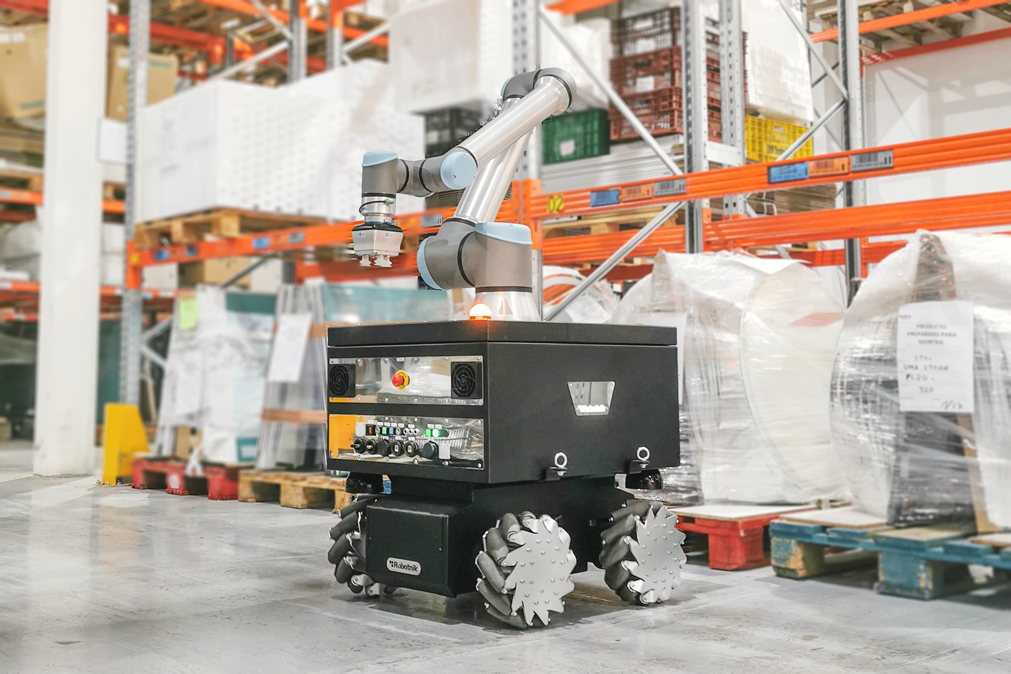 Mobile robot arm collaborating alongside human operator